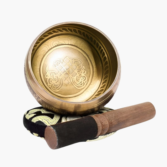 The CalmEcho Singing Bowl is a handcrafted Nepalese meditation bowl designed to produce deep, resonant tones that enhance relaxation, mindfulness, and spiritual practices. Made by skilled artisans, this bowl features intricate engravings, including a traditional Buddhist infinite knot symbol inside and a mantra inscription on the outer rim. The set includes a wooden striker with a suede-wrapped end for varied sound tones and a decorative cushion for stable placement.