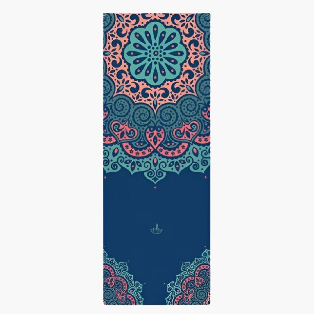 The EcoComfort Yoga Towel in the Aurora Path design is a premium microfiber towel created for stability, comfort, and hygiene during yoga practice. Featuring a rich navy blue background with intricate mandala patterns in shades of teal, coral, and soft pink, this design evokes a sense of elegance and balance. The skid-free surface ensures excellent grip, preventing slipping during intense or hot yoga sessions.