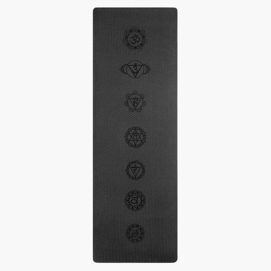 The EcoGrip Yoga Mat in the Chakra Alignment design is a high-performance, eco-friendly mat designed to provide superior grip, stability, and comfort during yoga and fitness practices. This sleek black mat features seven embossed chakra symbols, representing energy alignment and mindfulness. Its textured, non-slip surface ensures a steady grip, even during intense or hot yoga sessions, while the optimal cushioning supports joints without compromising balance.