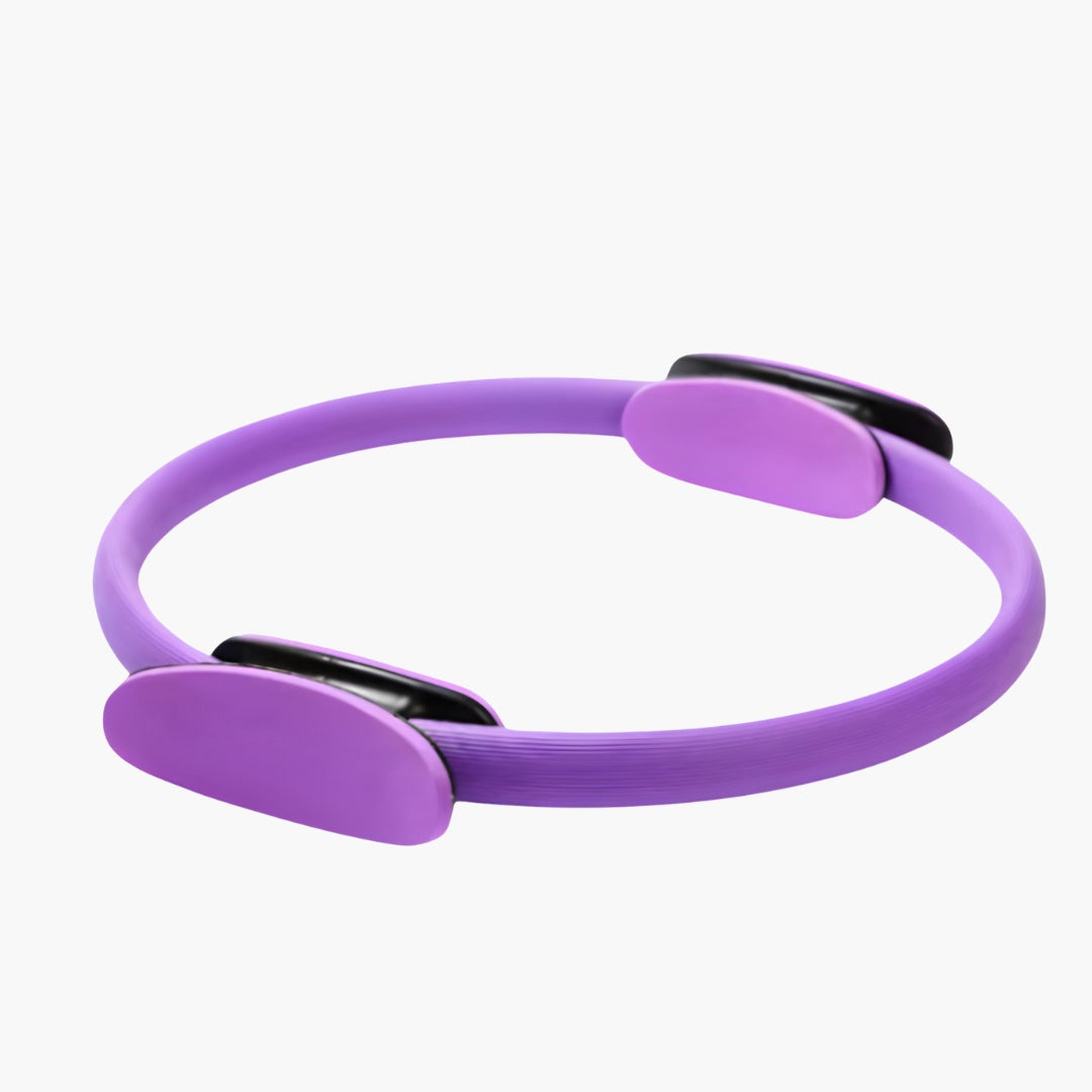 The FlexCircle Yoga and Pilates Ring in Purple is a versatile and lightweight fitness tool designed to enhance strength, flexibility, and muscle toning. With a diameter of 38 cm, this durable ring is made from eco-friendly PP material and features EVA foam-padded handles for a secure and comfortable non-slip grip. Ideal for targeting core muscles, toning thighs, and improving posture, it helps enhance balance and overall body alignment.