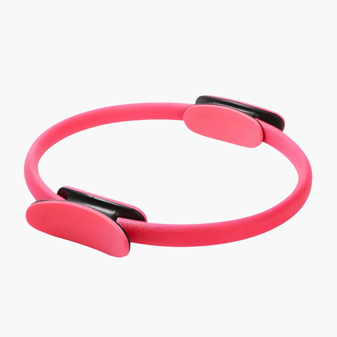 The FlexCircle Yoga and Pilates Ring in Red is a versatile fitness tool designed to strengthen core muscles, tone thighs, and improve flexibility. This lightweight yet durable ring measures 38 cm in diameter and is made from eco-friendly PP material with EVA foam-padded handles for a secure, comfortable, and non-slip grip. Its ergonomic design allows for targeted workouts, helping to enhance balance, posture, and overall muscle engagement.