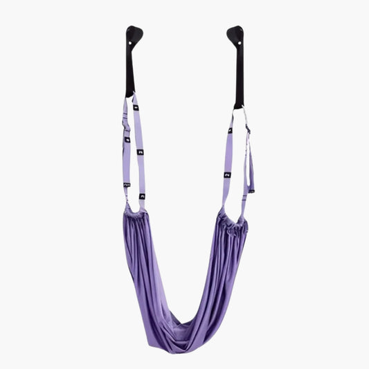 The FlexStrap is a premium aerial yoga hammock designed for inversion therapy, deep stretching, and enhanced flexibility. Made from durable, tear-resistant polyester, it supports up to 136 kg (300 pounds) and features adjustable straps with multiple loops for customized use. Ideal for aerial yoga, splits training, and full-body stretching, this lightweight and portable tool is perfect for home, studio, or travel use.