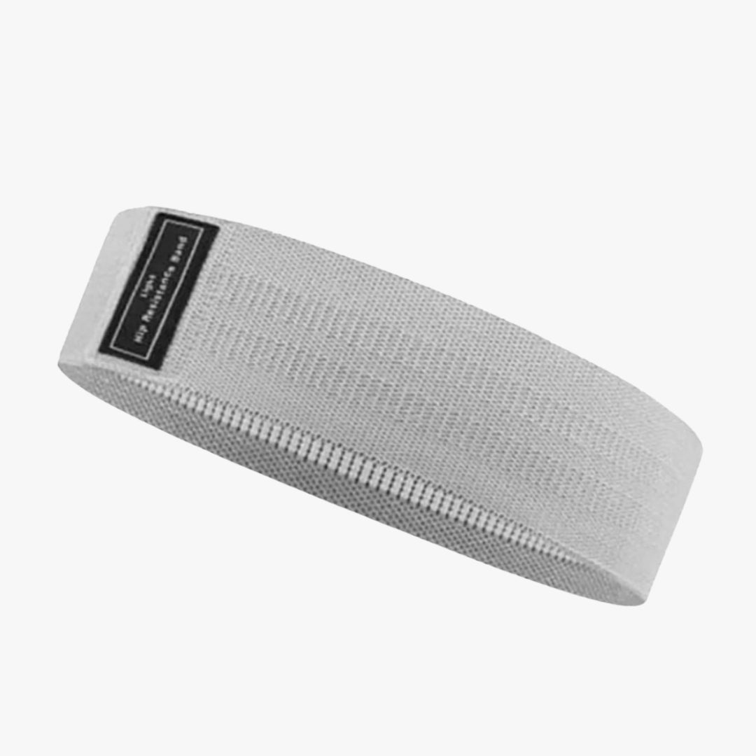The OmBand Resistance Loop in gray is a durable, non-slip yoga and fitness band designed for strength training, stretching, and mobility exercises. Made from eco-friendly rubber, it provides optimal resistance for flexibility, muscle toning, and rehabilitation. Ideal for home workouts, yoga sessions, or gym routines, ensuring stability and control with every movement.