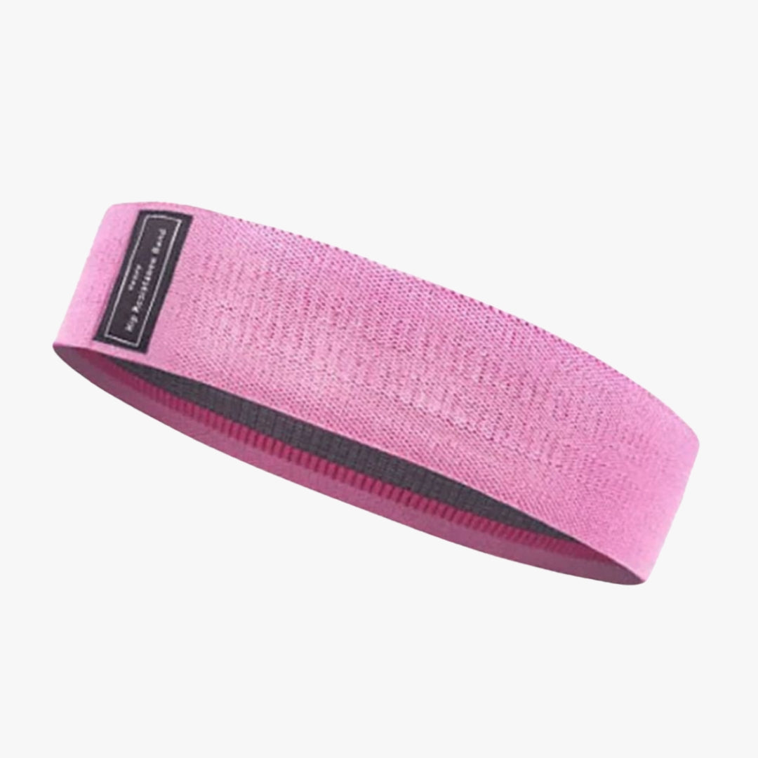 The OmBand Resistance Loop in pink is a durable, non-slip yoga and fitness band designed for strength training, stretching, and mobility exercises. Made from eco-friendly rubber, it provides optimal resistance for flexibility, muscle toning, and rehabilitation. Perfect for home workouts, yoga sessions, or gym routines, enhancing stability and control in every movement.