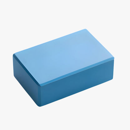 A high-quality blue EVA foam yoga block designed for stability, balance, and flexibility. Features a non-slip surface, lightweight build, and compact size, making it ideal for deepening stretches, improving posture, and enhancing yoga and Pilates practices.