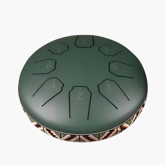 The SerenitySound Drum is a compact 6-inch (15 cm) steel tongue drum with 8 harmonically tuned notes, designed to produce calming and ethereal melodies. Its deep resonance makes it perfect for meditation, relaxation, yoga, and sound therapy. The drum features a durable steel body with a decorative fabric-trimmed base, adding both style and stability.

This versatile percussion instrument can be played with hands or included mallets, making it accessible for beginners and experienced musicians alike.