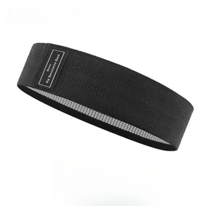 Image of the OmBand, a durable and elastic resistance band made from high-quality polyester and latex silk. Shown in light gray, this versatile band is designed for lower body exercises, providing resistance to enhance strength, flexibility, and muscle tone. Perfect for all fitness levels, it is an essential accessory for home or gym workouts.