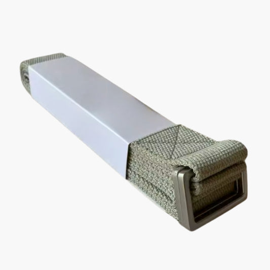The FlexCore yoga strap in sage green, neatly folded with a sturdy metal buckle, designed for deepening stretches, improving flexibility, and supporting proper alignment in yoga practice. Made from durable, eco-friendly cotton for a secure and comfortable grip.