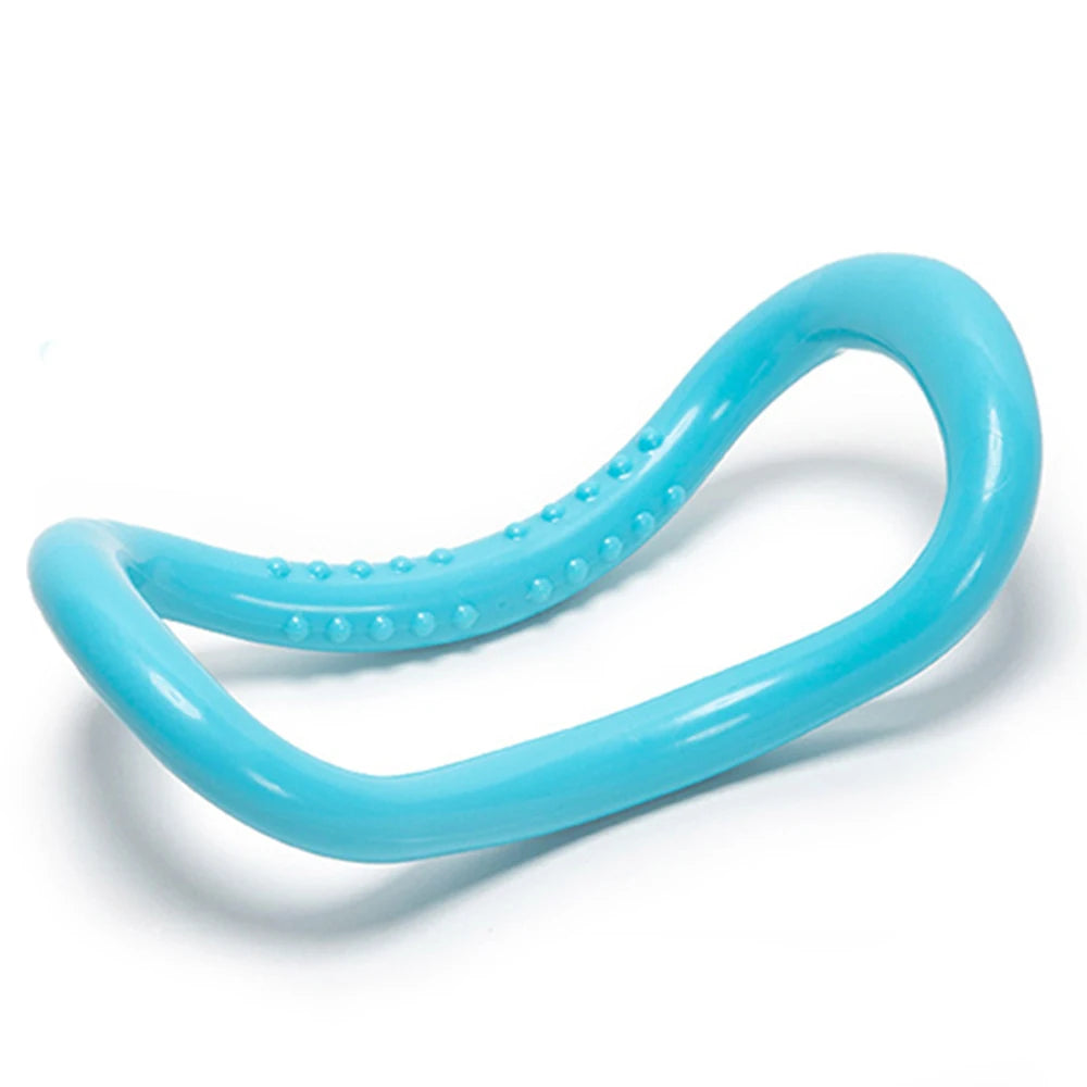 Image of the FlexiCurve Ring in a blue color, featuring an ergonomic double-curve design with textured details for grip and massage. The compact, lightweight tool is ideal for yoga, Pilates, muscle stretching, and relaxation, made from eco-friendly recyclable PP material for durability and long-term use.