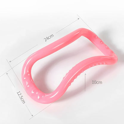 Image of the FlexiCurve Ring in a bright pink color, featuring an ergonomic double-curve design with textured details for grip and massage. The compact, lightweight tool is ideal for yoga, Pilates, muscle stretching, and relaxation, made from eco-friendly recyclable PP material for durability and long-term use.