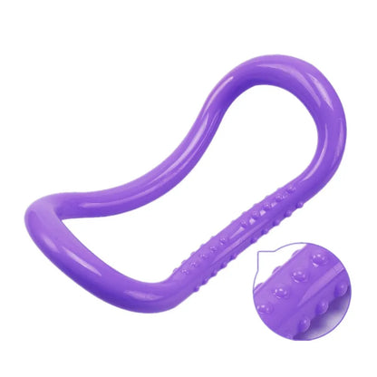 Image of the FlexiCurve Ring in a purple color, featuring an ergonomic double-curve design with textured details for grip and massage. The compact, lightweight tool is ideal for yoga, Pilates, muscle stretching, and relaxation, made from eco-friendly recyclable PP material for durability and long-term use.