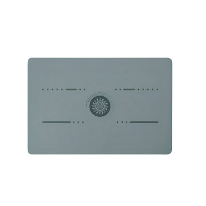 Image of the FlexPad, a rectangular yoga pad in gray, designed for targeted support and comfort during yoga or fitness exercises. The pad features a central patterned design and subtle grooves, made from eco-friendly PU natural rubber. Compact and lightweight, it provides stability and cushioning for knees, head, or other sensitive areas.