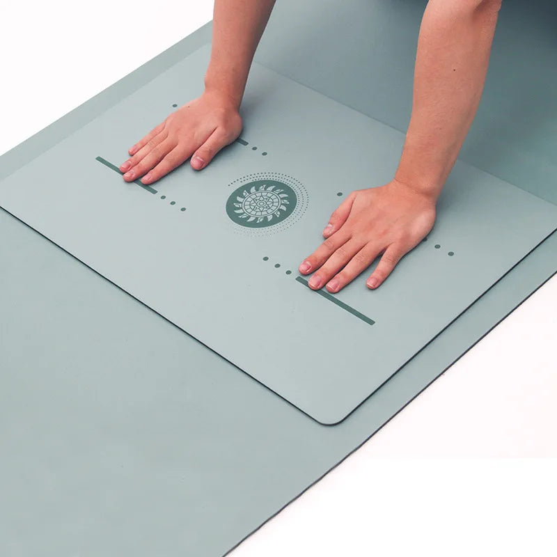 Image of the FlexPad, a rectangular yoga pad in gray, designed for targeted support and comfort during yoga or fitness exercises. The pad features a central patterned design and subtle grooves, made from eco-friendly PU natural rubber. Compact and lightweight, it provides stability and cushioning for knees, head, or other sensitive areas.