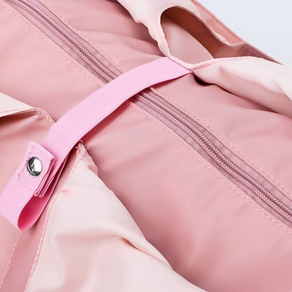 Close-up view of the Move Ease yoga and gym bag in pink, showcasing its secure zipper closure and reinforced strap with a button clasp. Designed for durability and style, this bag keeps your workout essentials organized and easily accessible.