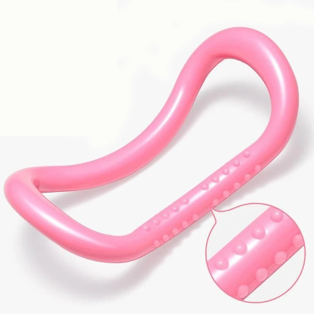 Image of the FlexiCurve Ring in a bright pink color, featuring an ergonomic double-curve design with textured details for grip and massage. The compact, lightweight tool is ideal for yoga, Pilates, muscle stretching, and relaxation, made from eco-friendly recyclable PP material for durability and long-term use.