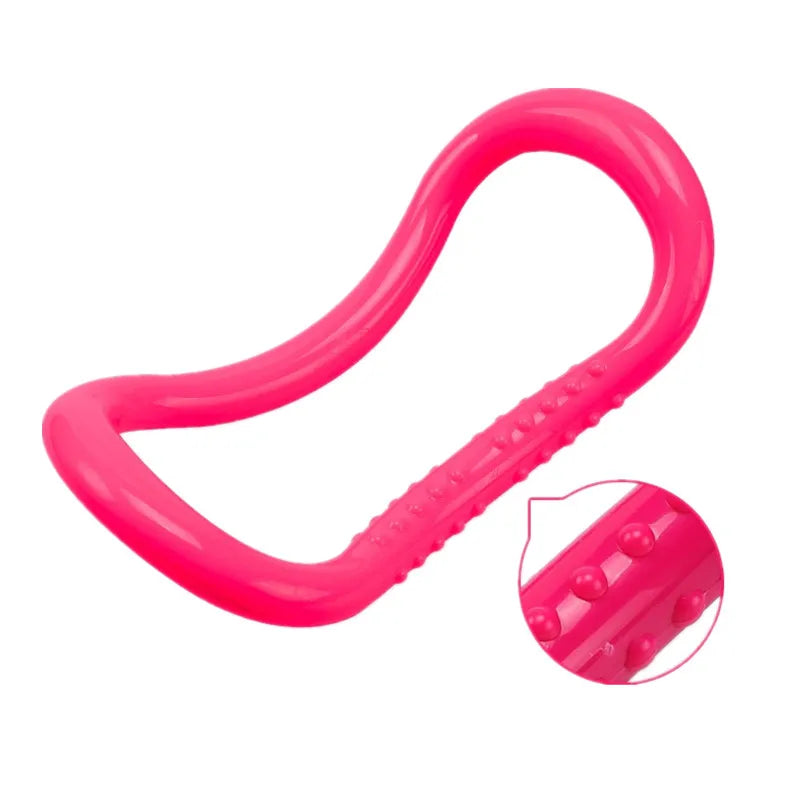 Image of the FlexiCurve Ring in a bright pink color, featuring an ergonomic double-curve design with textured details for grip and massage. The compact, lightweight tool is ideal for yoga, Pilates, muscle stretching, and relaxation, made from eco-friendly recyclable PP material for durability and long-term use.