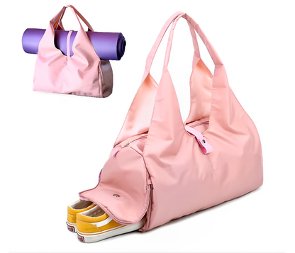 Image of the Move Ease Yoga Mat Bag available in pink and black colors. These durable nylon bags feature a spacious interior for carrying yoga mats, workout gear, and personal essentials. With a minimalist and unisex design, they include comfortable carrying options through handles or an adjustable shoulder strap, making them ideal for fitness enthusiasts on the go.