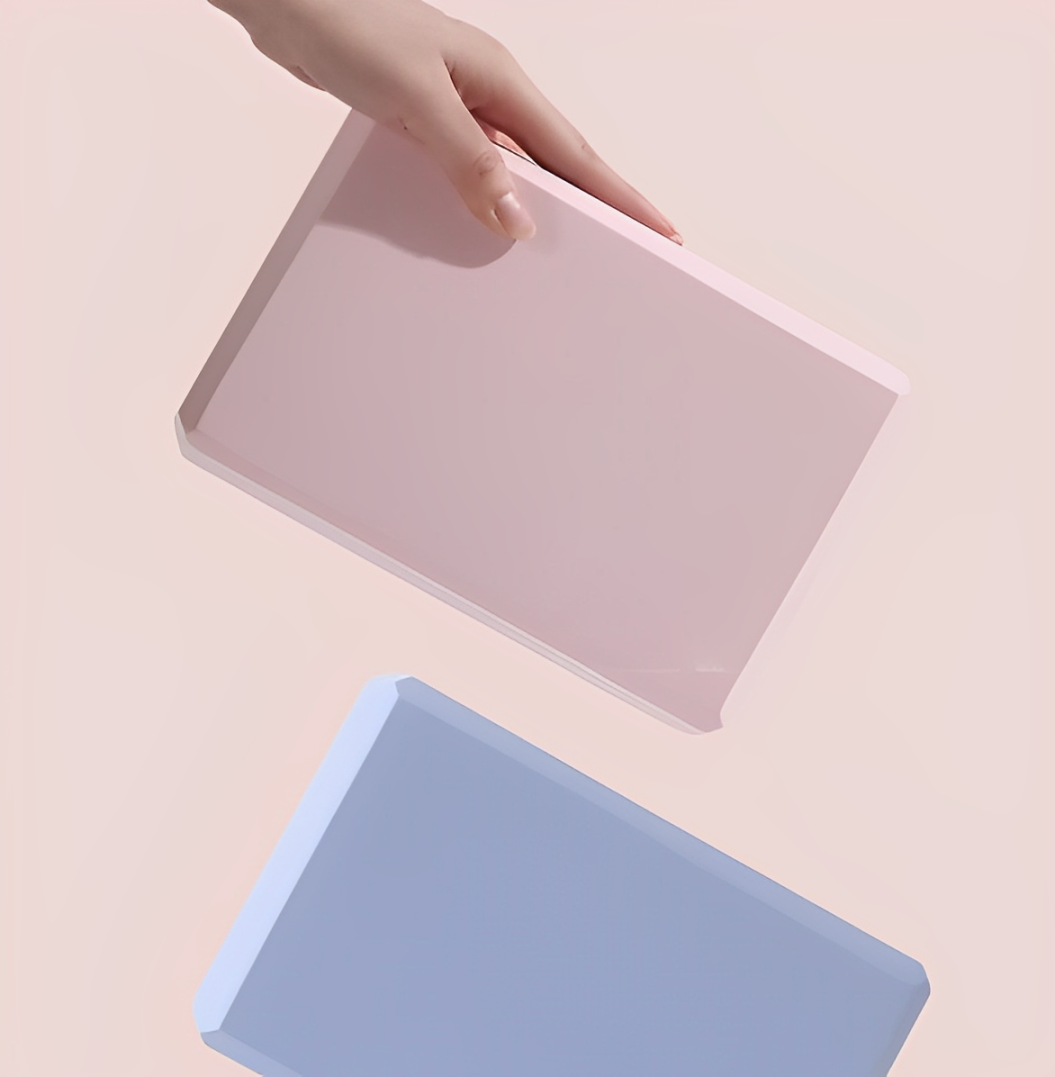 pink and blue poselift yoga block plentyoga