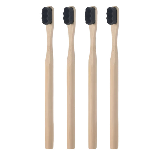 Image of PureEarth toothbrushes featuring natural bamboo handles and black bristles. These eco-friendly toothbrushes are designed to reduce plastic waste while providing a deep and effective clean. Displayed in a minimalist setting, they are perfect for those seeking a sustainable oral care solution.