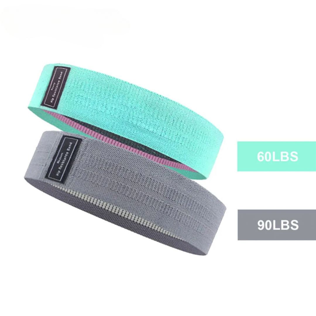 Image of the OmBand, a durable and elastic resistance band made from high-quality polyester and latex silk. Shown in light gray, this versatile band is designed for lower body exercises, providing resistance to enhance strength, flexibility, and muscle tone. Perfect for all fitness levels, it is an essential accessory for home or gym workouts.