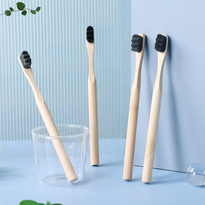 Image of PureEarth toothbrushes featuring natural bamboo handles and black bristles. These eco-friendly toothbrushes are designed to reduce plastic waste while providing a deep and effective clean. Displayed in a minimalist setting, they are perfect for those seeking a sustainable oral care solution.